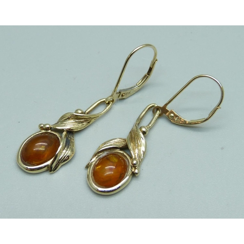 962 - A pair of 9ct gold and amber drop earrings, 3.9g