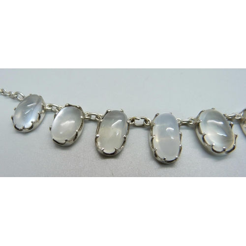 971 - An Arts and Crafts moonstone necklet, tests as silver, 43.5cm