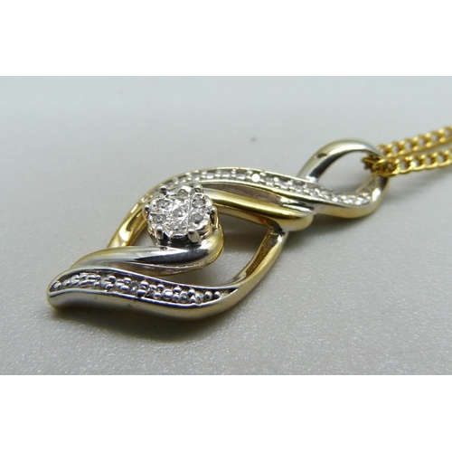 981 - A silver gilt and diamond pendant with chain