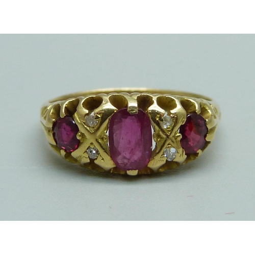 986 - An 18ct gold, ruby and diamond ring, Birmingham 1906, 3.6g, L