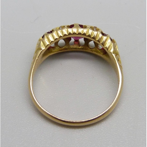 986 - An 18ct gold, ruby and diamond ring, Birmingham 1906, 3.6g, L