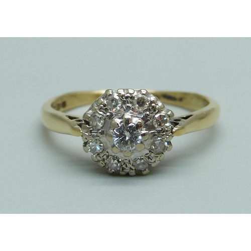 988 - An 18ct gold and diamond cluster ring, 3g, O