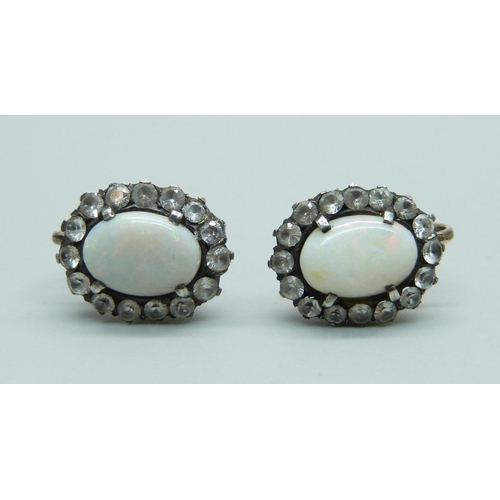 990 - A pair of opal and white stone cluster screw back earrings