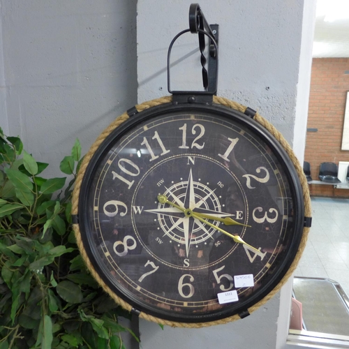 1311 - A black metal and rope industrial style clock depicting a compass