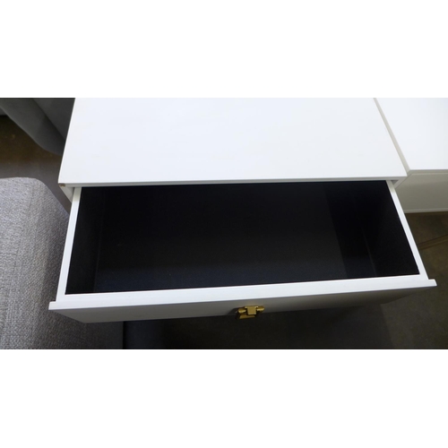 1466 - A pair of white bedside tables with cross legs