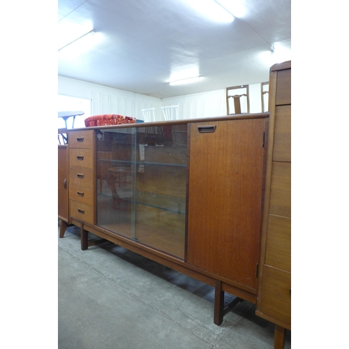 104 - A Turnidge of London teak bookcase