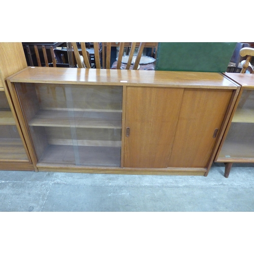 106 - A teak bookcase