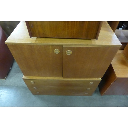 112 - Two G-Plan teak bookcase tops, a lowboard and five other teak units