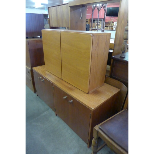 112 - Two G-Plan teak bookcase tops, a lowboard and five other teak units