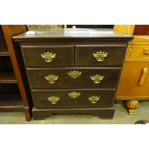 152 - A George III style oak bachelor's chest of drawers