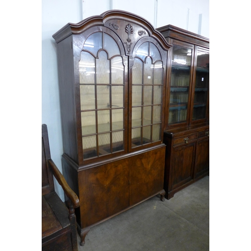 159 - A Queen Anne style walnut display cabinet