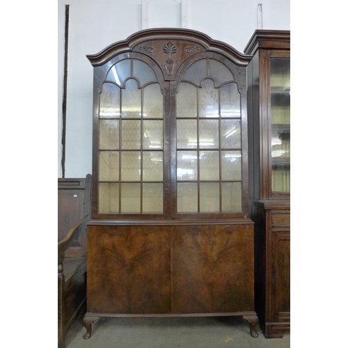 159 - A Queen Anne style walnut display cabinet