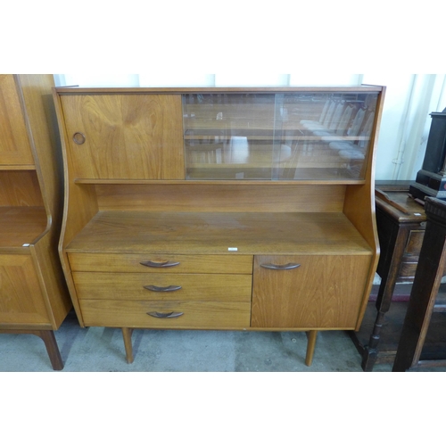 19 - An Avalon teak highboard