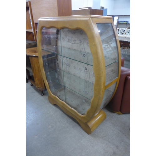 209 - An Art Deco walnut display cabinet