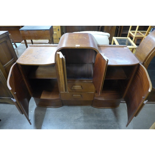 218 - An Art Deco figured walnut sideboard/cocktail cabinet