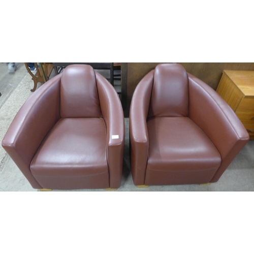 223 - A pair of Art Deco style burgundy leather armchairs