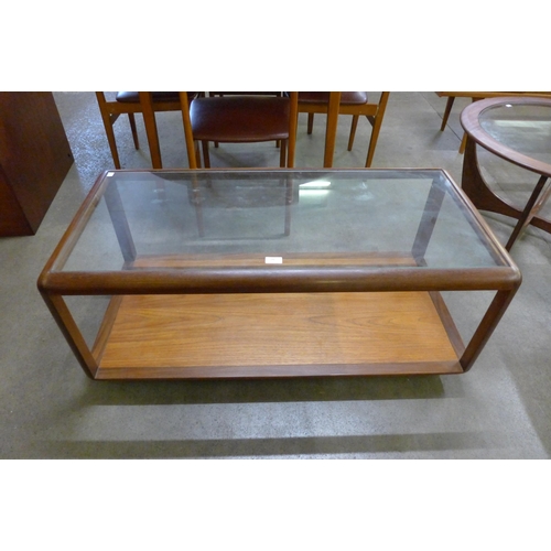 24 - A G-Plan Fresco teak and glass topped rectangular coffee table