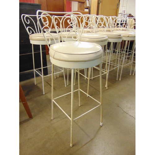 259 - A set of twelve Italian style cream metal and vinyl bar stools