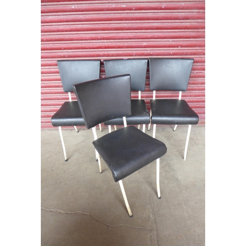 264C - A set of four white tubular steel framed kitchen chairs