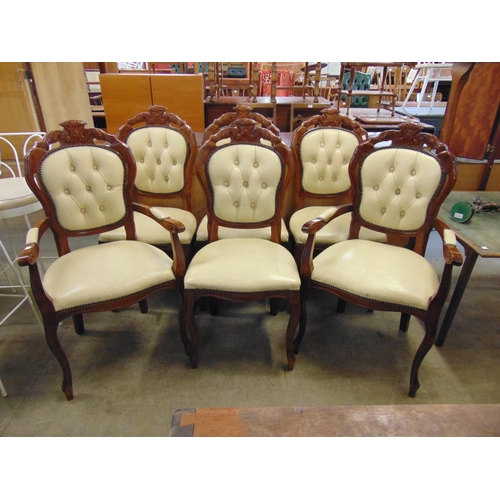 265 - A set of six Italian walnut dining chairs