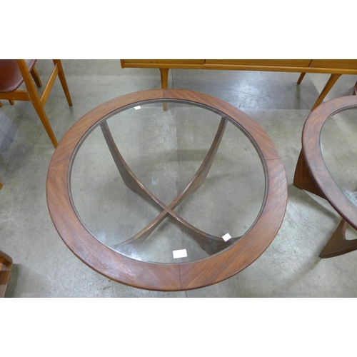 27 - A G-Plan Astro teak and glass topped circular coffee table