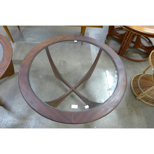 28 - A G-Plan Astro teak and glass topped circular coffee table