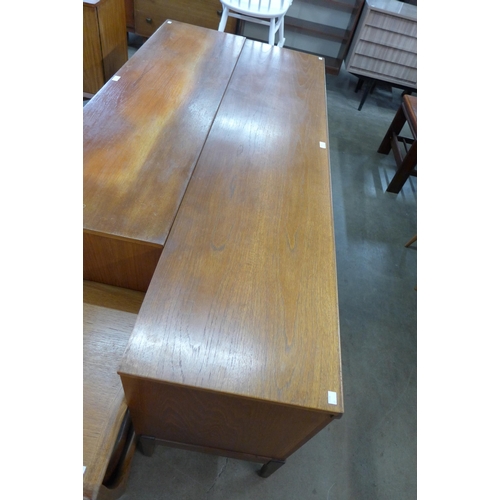 38 - A teak sideboard