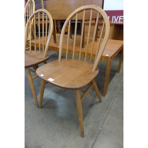 61 - A pair of Ercol Blonde elm and beech Windsor chairs