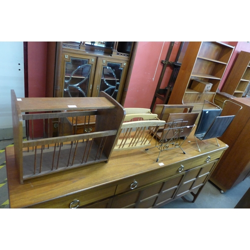 68 - Two teak magazine racks, two metal magazine racks and one other