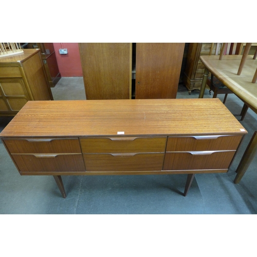 81 - An Austin Suite teak six drawer sideboard