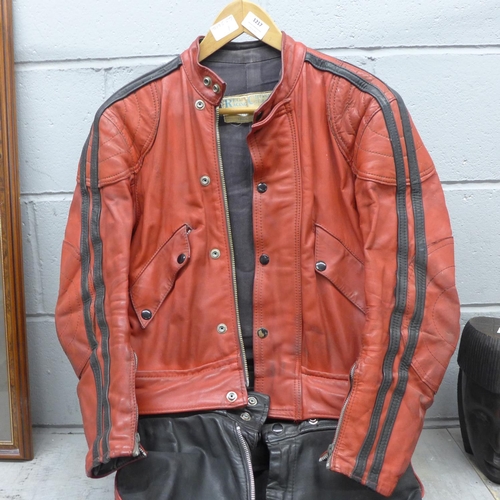 A Reg Cross Racing Clothing two piece leather motorcycle racing suit