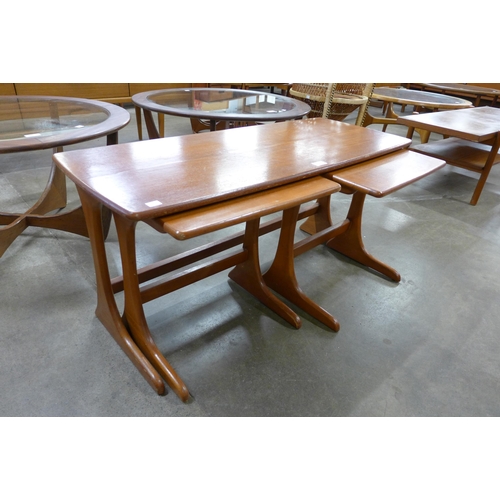 30 - A teak nest of tables