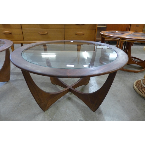 31 - A G-Plan Astro teak and glass topped circular coffee table