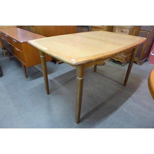 50 - A Meredew teak extending dining table