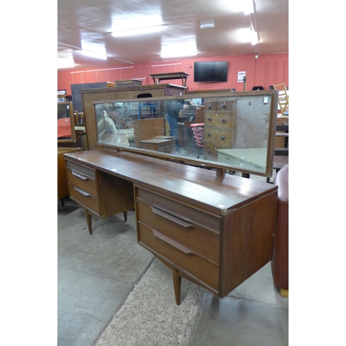 67 - Two White & Newton tola wood dressing tables and a pair of bedside tables