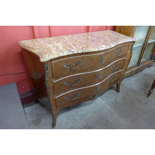 102 - A French Louis XV style inlaid kingwood and marble topped serpentine commode