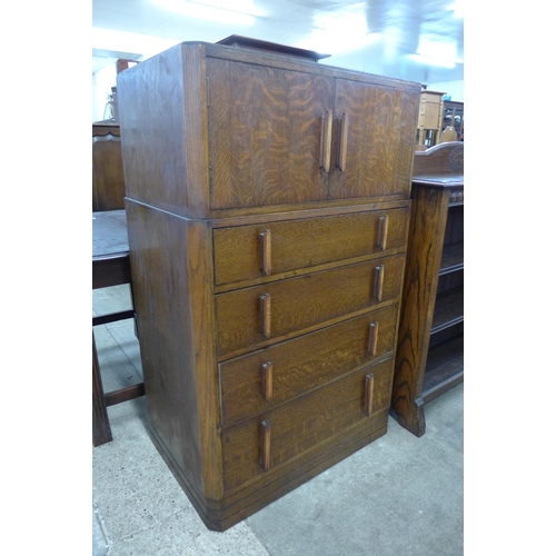 130 - An Art Deco oak tallboy