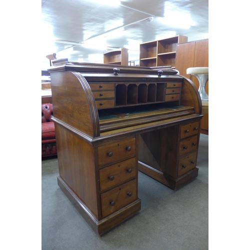 140 - A Victorian mahogany cylinder roll top desk