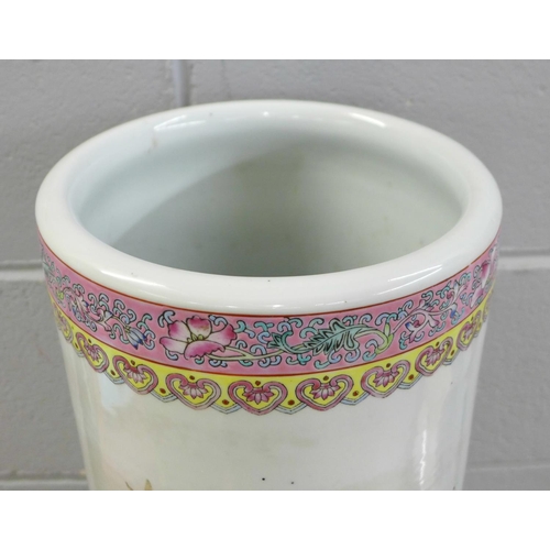 335 - An early 20th oriental famille rose porcelain stick stand, 60cms h