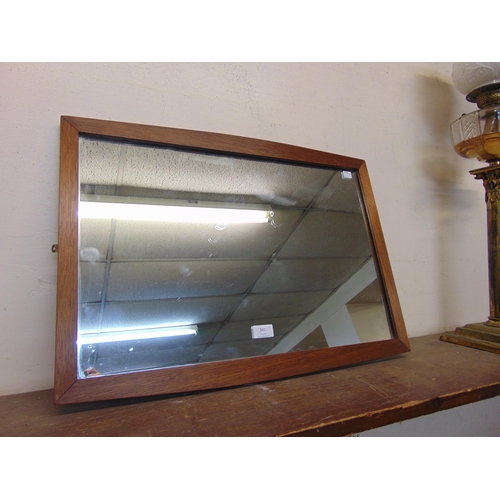 364 - An oak framed mirror