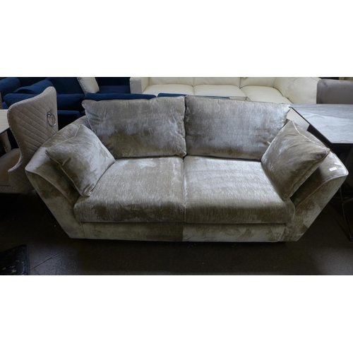 1469 - A champagne crushed velvet three seater sofa