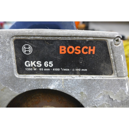 2026 - Bosch 110v circular saw, GKS 65 1200w 65mm, disc size 190mm and qty. of 110v extension cables - 2 ex... 