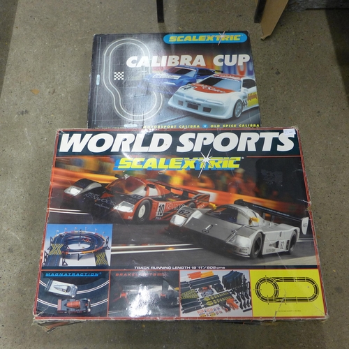 2092 - A Scalextric World Sports set, a Calibra Cup set, five extra cars including F1, Aston Martin and Mer... 