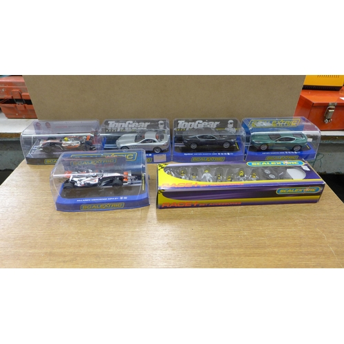 2092 - A Scalextric World Sports set, a Calibra Cup set, five extra cars including F1, Aston Martin and Mer... 