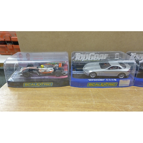 2092 - A Scalextric World Sports set, a Calibra Cup set, five extra cars including F1, Aston Martin and Mer... 