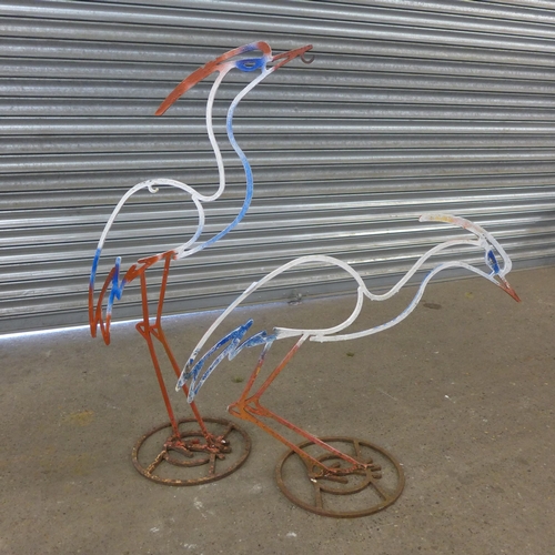 2246 - 2 Decorative metal heron figures and 2 hanging basket brackets