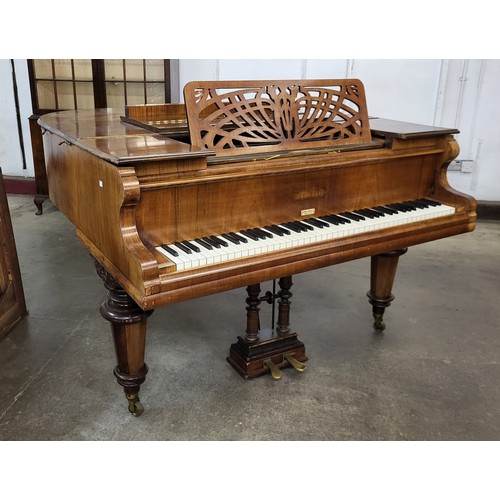 141 - An early 20th Century Beulhoff walnut Baby Grand piano. This lot is sold with non-transferable stand... 