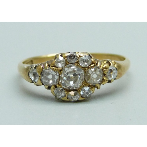 1002 - An 18ct gold antique old cut diamond cluster ring, 3.6g, Q