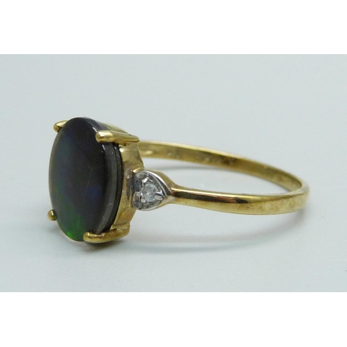 1015 - A 9ct gold, ammolite and zircon ring, 2.2g, U, with certificate