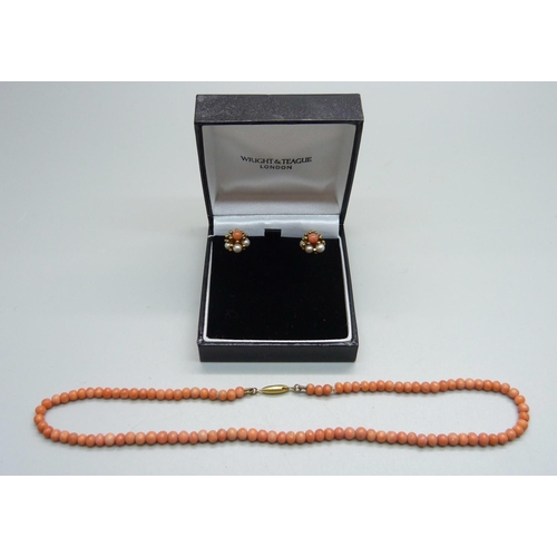 1018 - A pair of 9ct gold, coral and pearl earrings and a 9ct gold mounted coral necklace, 37cm